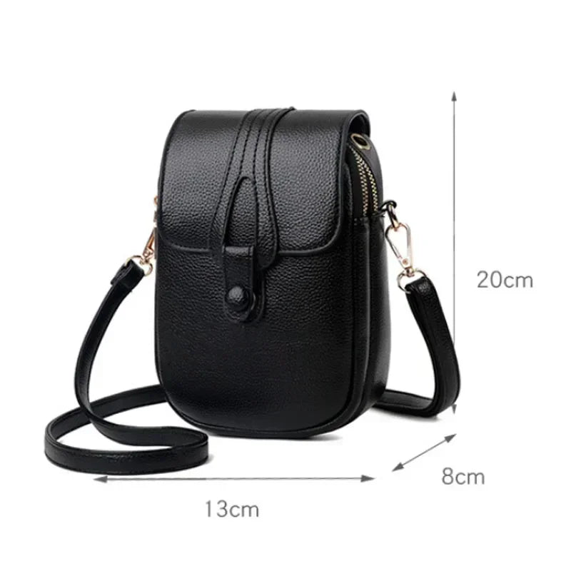 Black small crossbody handbag with flap closure and adjustable shoulder strap