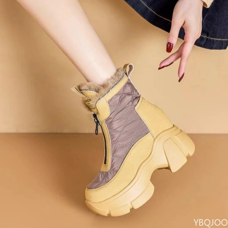 Yellow and gray winter boot with fur lining on a beige background, featuring the brand 'YBQJOO'.