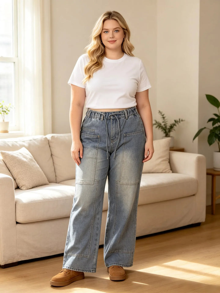 Light blue denim cargo jeans with drawstring waist and wide straight legs