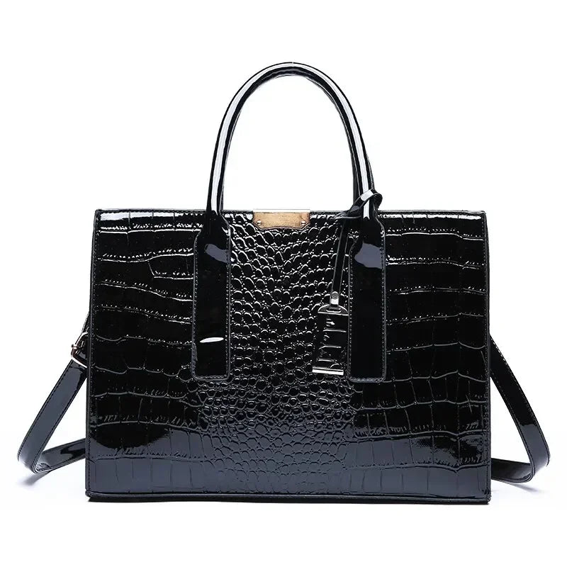 Crocodile-pattern leather tote handbag with top handles and shoulder strap, black.