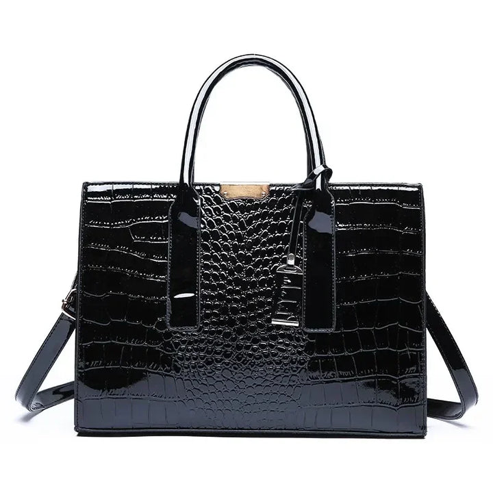 Crocodile-pattern leather tote handbag with top handles and shoulder strap, black.