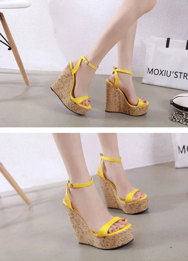 Eilyken women’s yellow wedge platform sandals on feet with ankle buckle straps