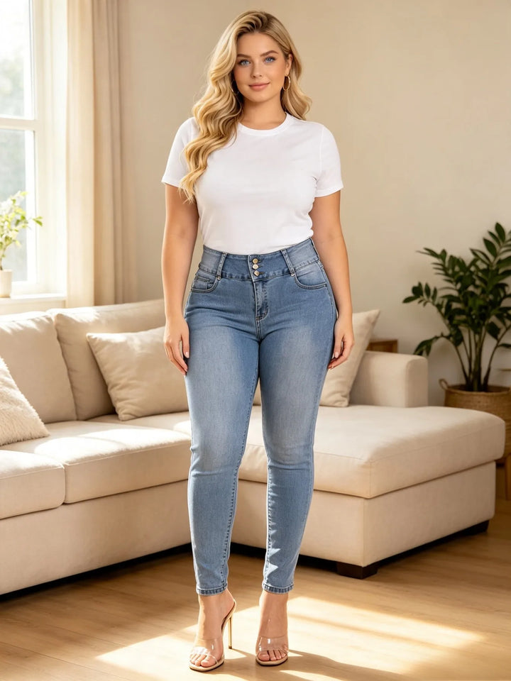 Blue high-rise stretch denim jeans with rhinestone pocket embroidery and 3-button front