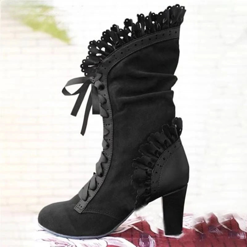 Black mid-calf lace-up high-heel boots with ruffled cuff and front lace detail
