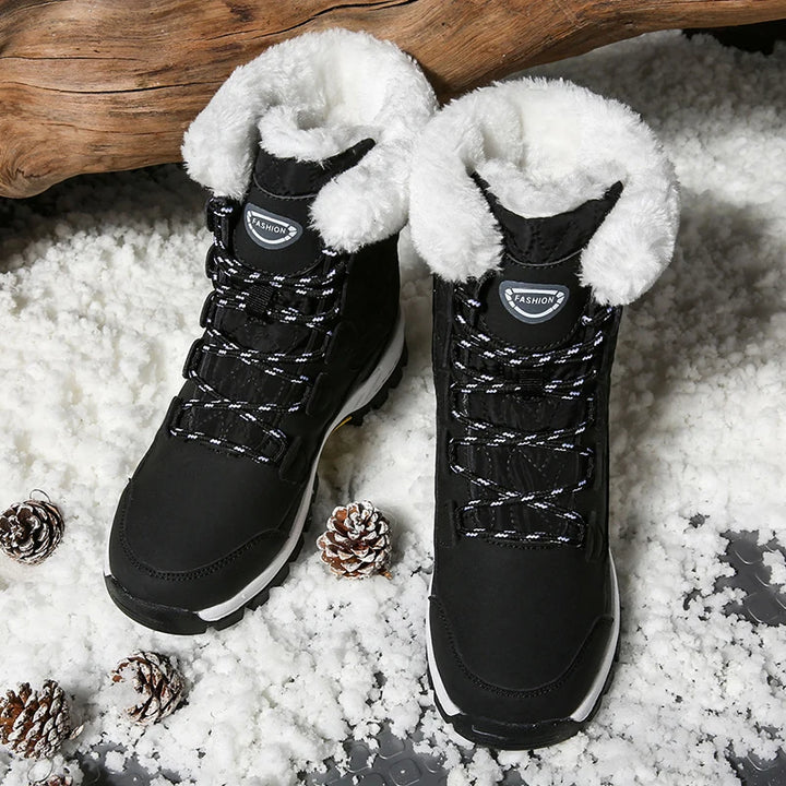 Women's black mid-calf lace-up snow boots with plush fleece lining and textured sole