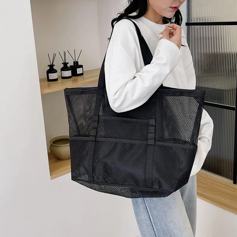 Black sheer mesh tote bag, open top, interior zip pocket, foldable large capacity