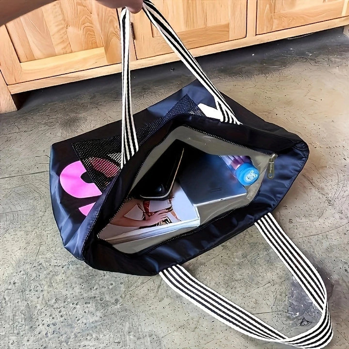 Open tote bag showing laptop interlayer and striped carry handles with front pocket