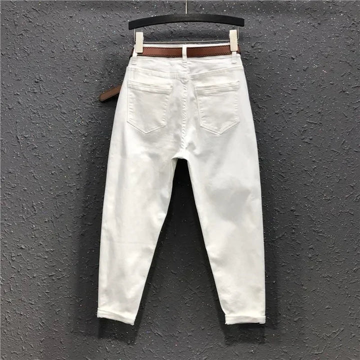 High-waist wide-leg jeans in white, showing two front pockets and belt loops