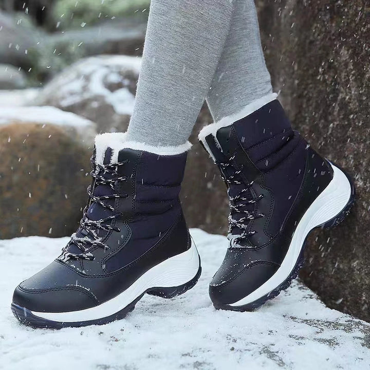 Women's lace-up winter snow boots, dark navy with white sole and plush cuff trim
