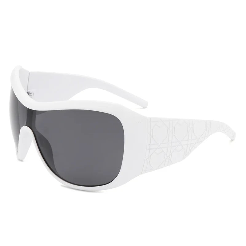White sunglasses with a large black lens on a white background