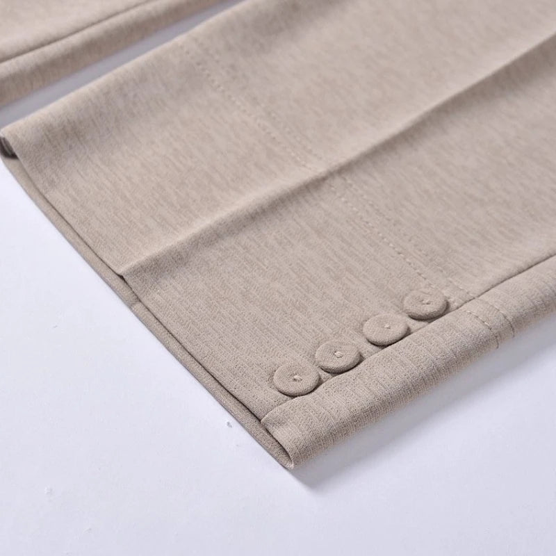 Khaki ankle-crop hem with decorative button-like trim