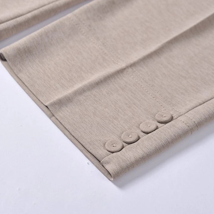 Khaki ankle-crop hem with decorative button-like trim