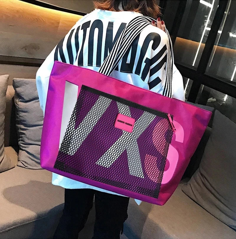 PURPLE waterproof nylon tote bag with bold white and pink letter print, mesh front panel
