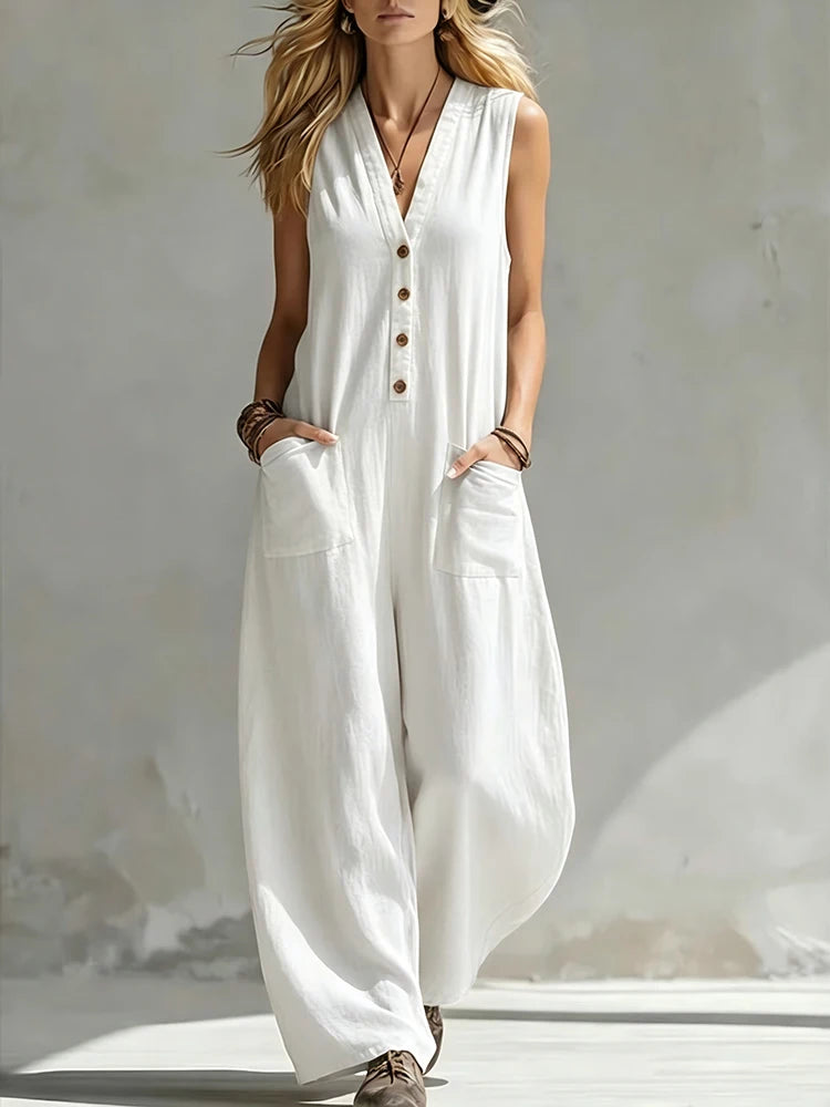 Women's white sleeveless V-neck button jumpsuit with patch pockets, wide-leg