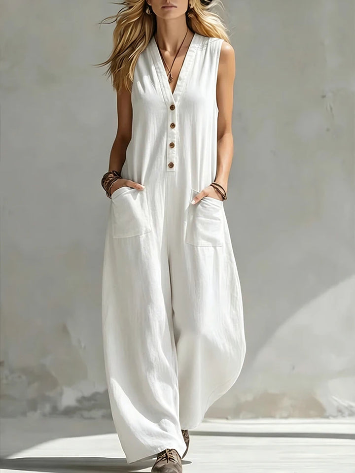 Women's white sleeveless V-neck button jumpsuit with patch pockets, wide-leg