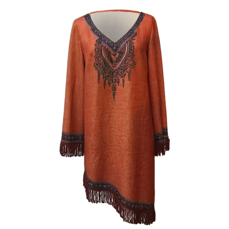 Orange dress with intricate black embroidery and fringes on a white background