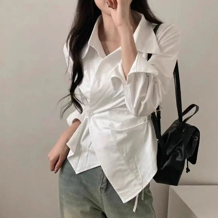 White long-sleeve blouse with pointed collar and gathered front