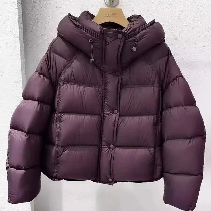 Burgundy hooded puffer coat with cotton padding and front zip closure
