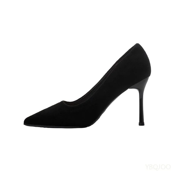 Black high-heeled shoe on a white background