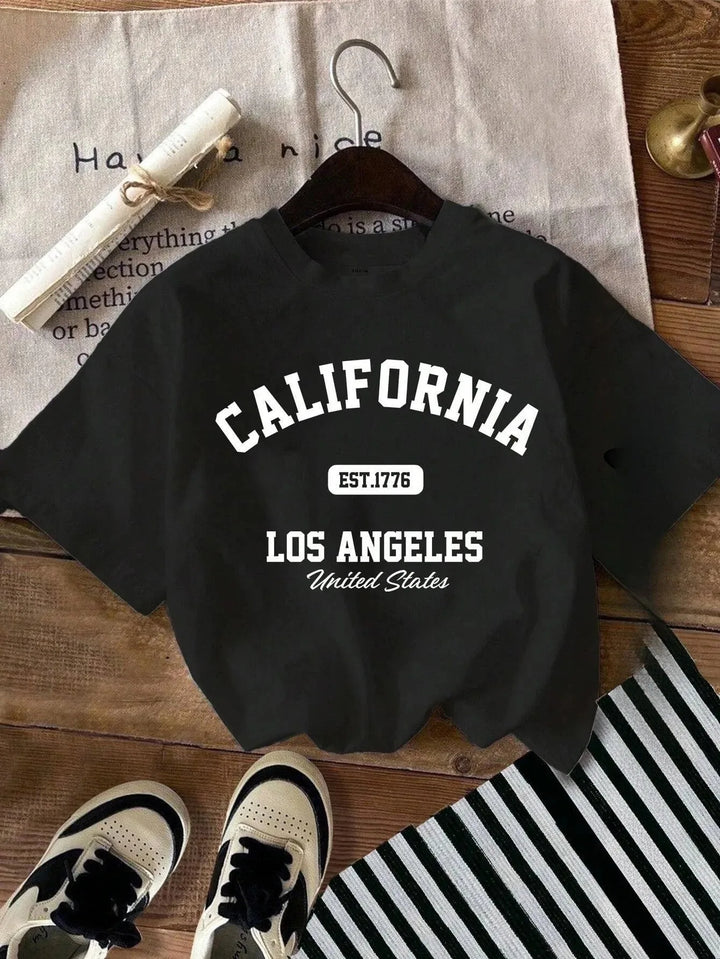Black plus size graphic tee with CALIFORNIA Los Angeles EST 1776 front print