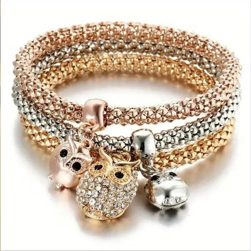 Armband mit Eulen-, Glocken- und Herzanhängern, Roségold und Silber