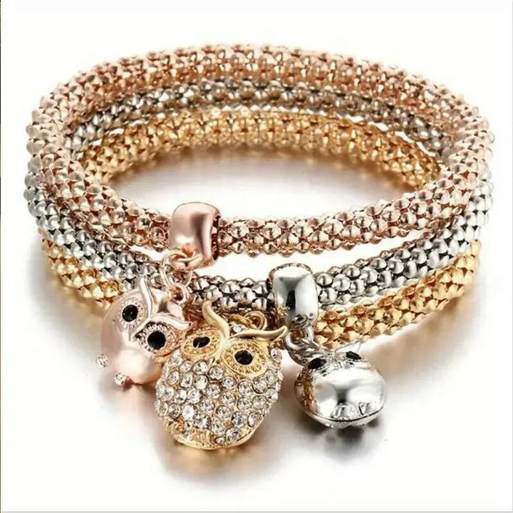 Armband mit Eulen-, Glocken- und Herzanhängern, Roségold und Silber