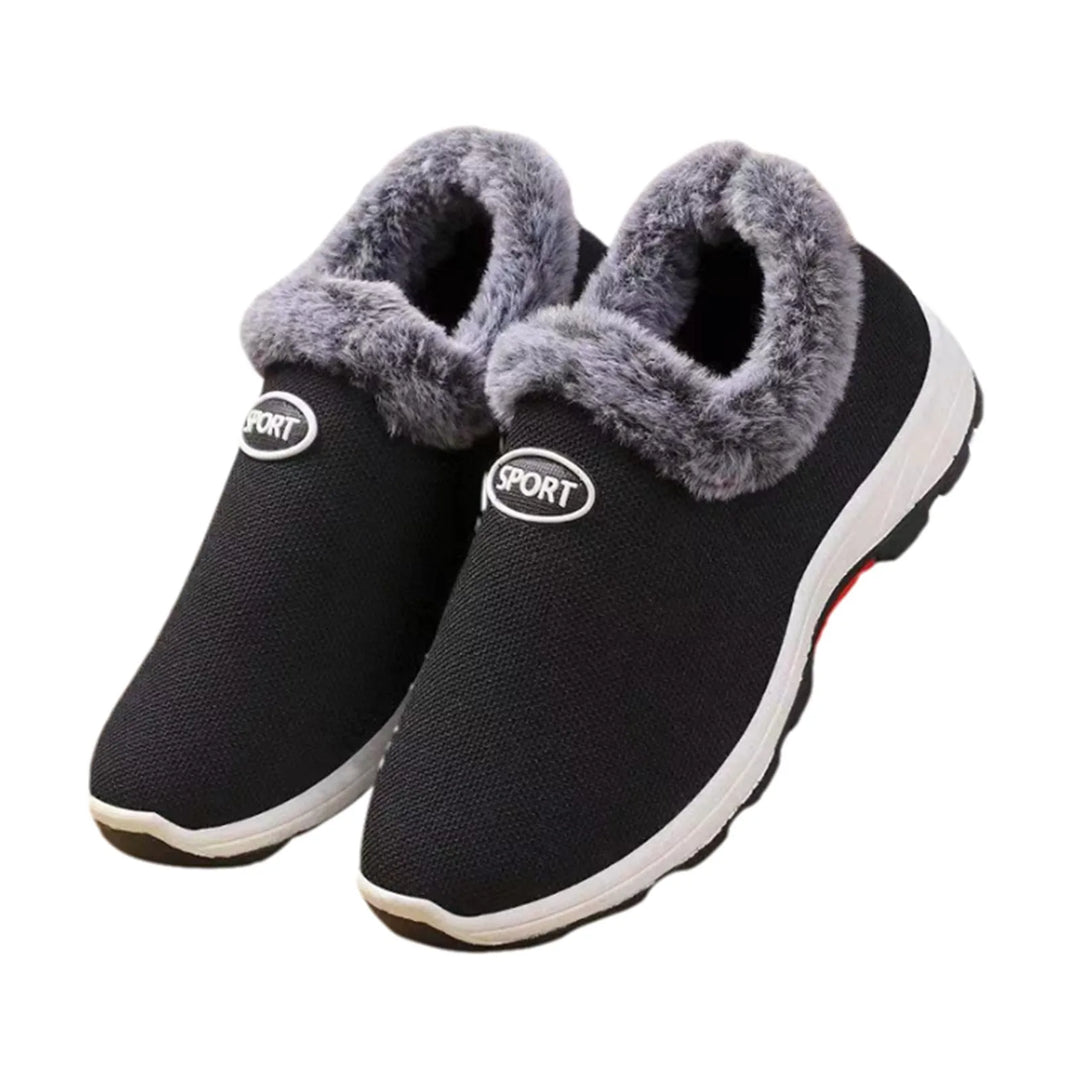 Women’s black slip-on sneakers with gray plush lining, round toe, and white sole