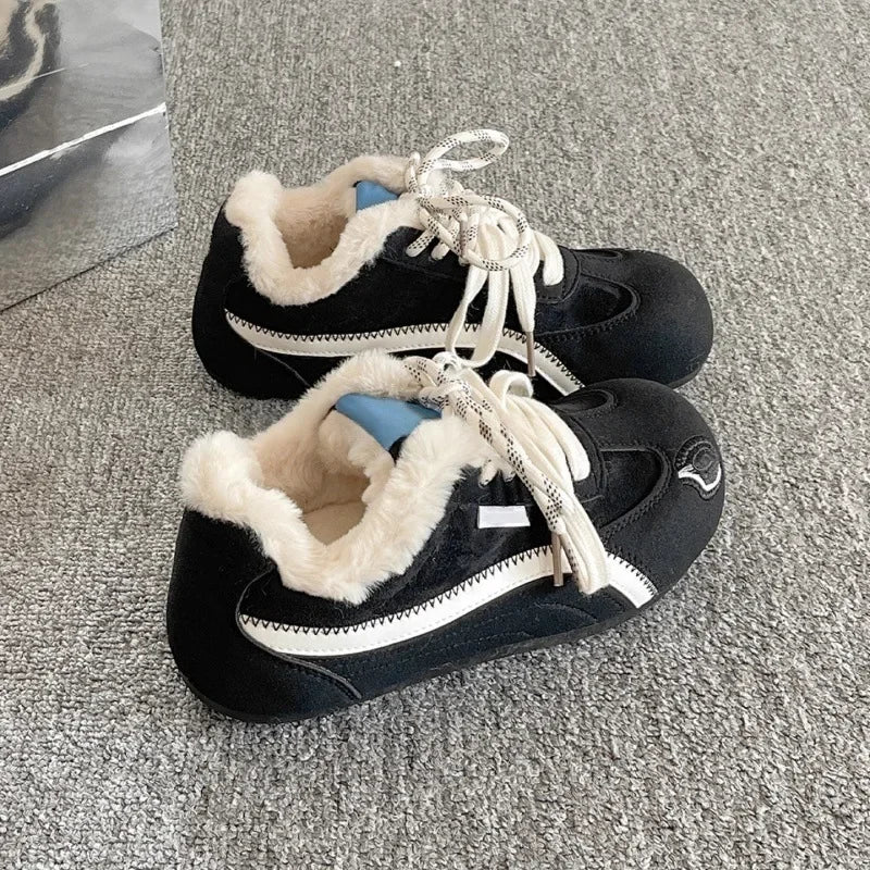 Black suede lace-up platform sneakers with faux fur collar and white rubber sole