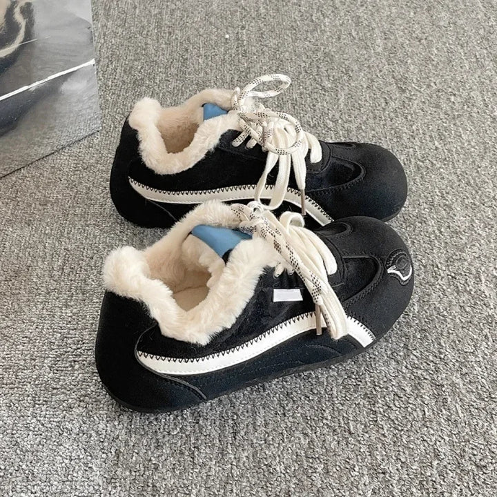 Black suede lace-up platform sneakers with faux fur collar and white rubber sole