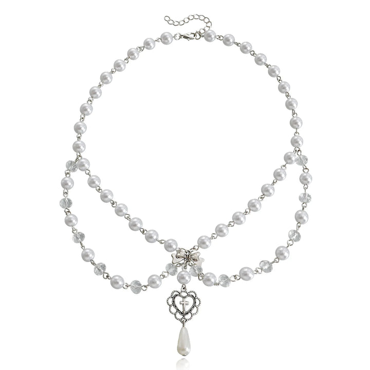 Ivory pearl multi-strand necklace with heart pendant and teardrop drop, silver-tone chain