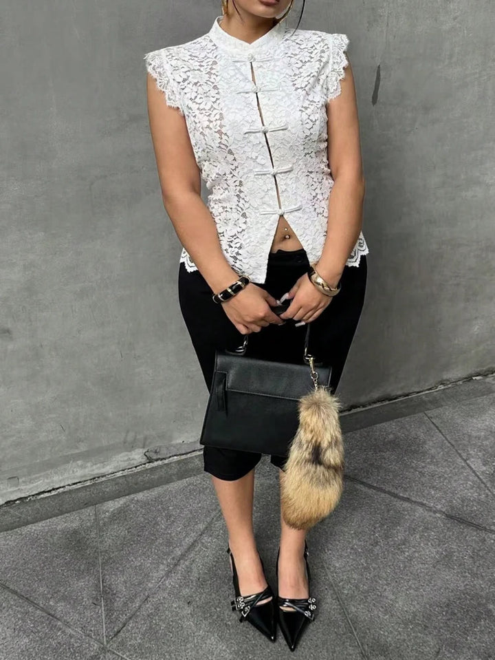 White lace sleeveless blouse with stand collar and vertical frog-button placket