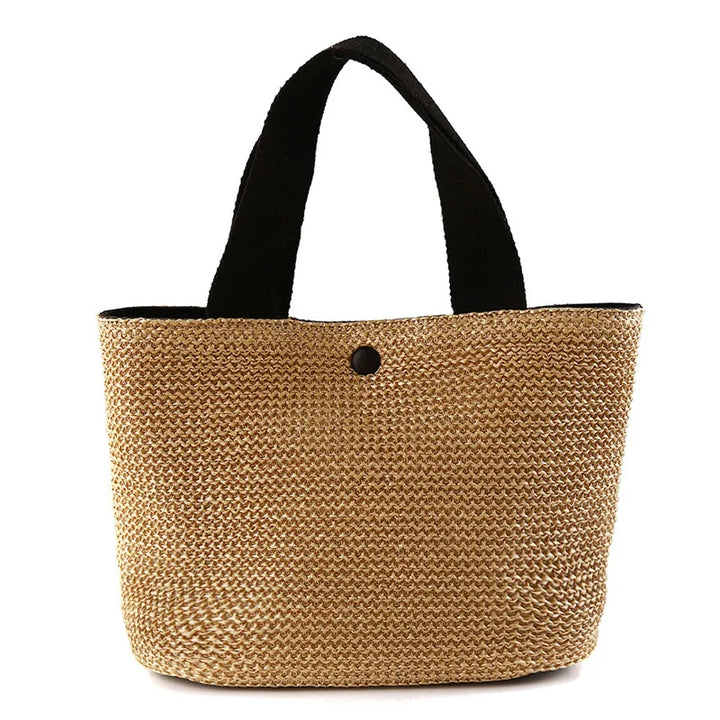 Bohemian woven straw bucket handbag in beige with black top handles and button detail