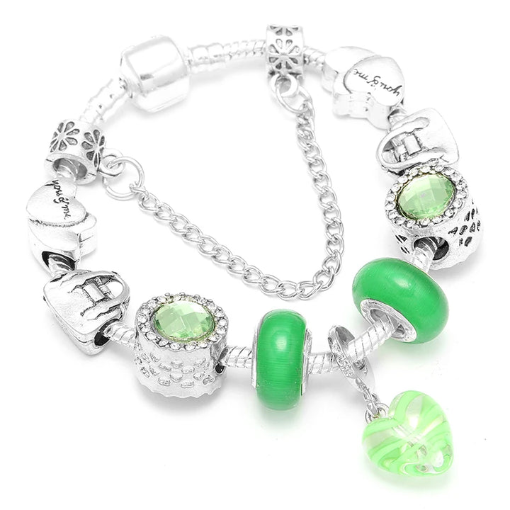 Silbernes Schlangenketten-Armband mit Herz-Anhänger, grünen Glasperlen und Kristall-Charm