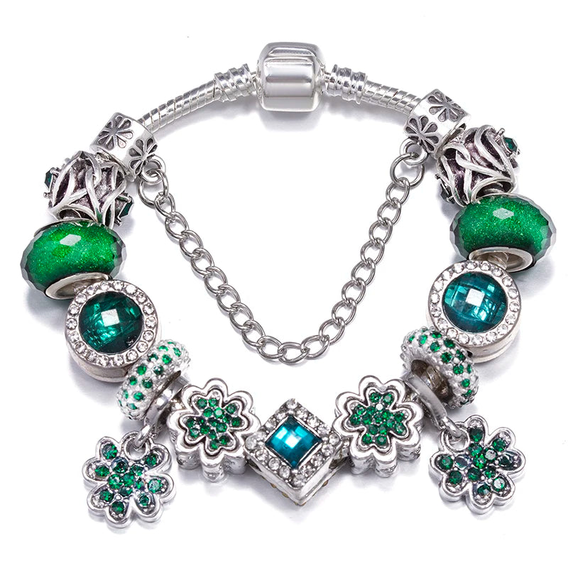 Silver charm bracelet with green and teal crystal beads and clover flower charms