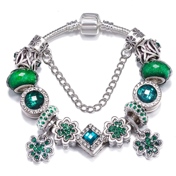 Silver charm bracelet with green and teal crystal beads and clover flower charms