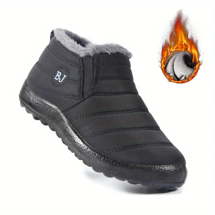Black winter boot with gray lining and flame graphic on a white background