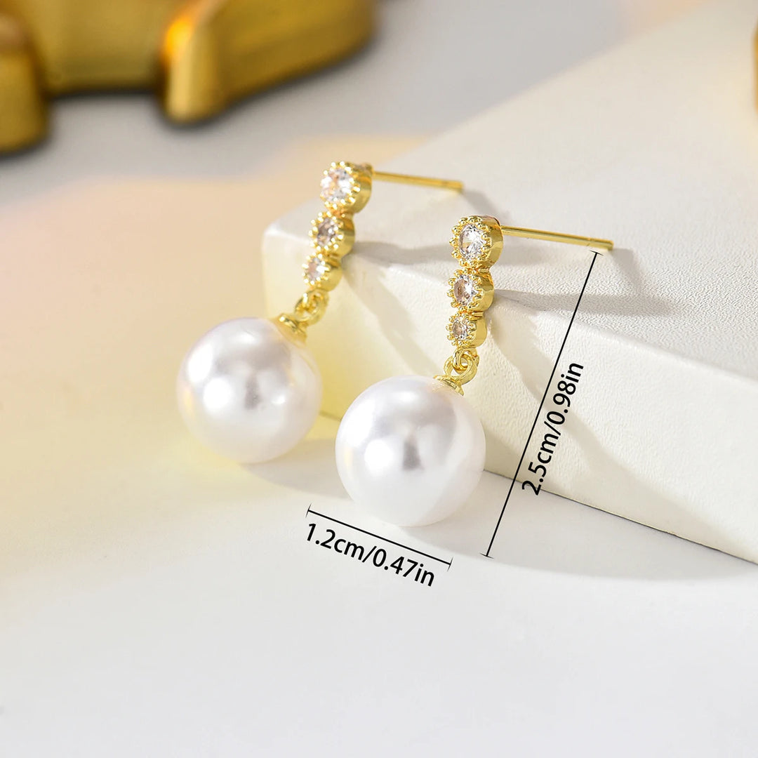 Gold-plated pearl drop dangle earrings with 7.2cm/0.47in length marked