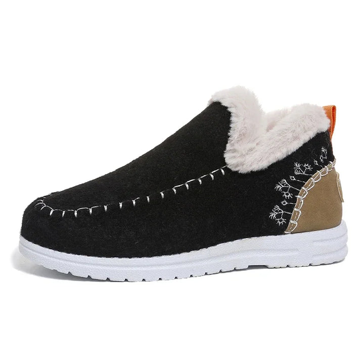 Black felt slip-on ankle snow loafer with white fleece-lined collar and white sole