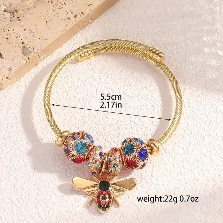 Beaded bangle with multicolor charm butterfly, gemstone details, 5.5cm diameter