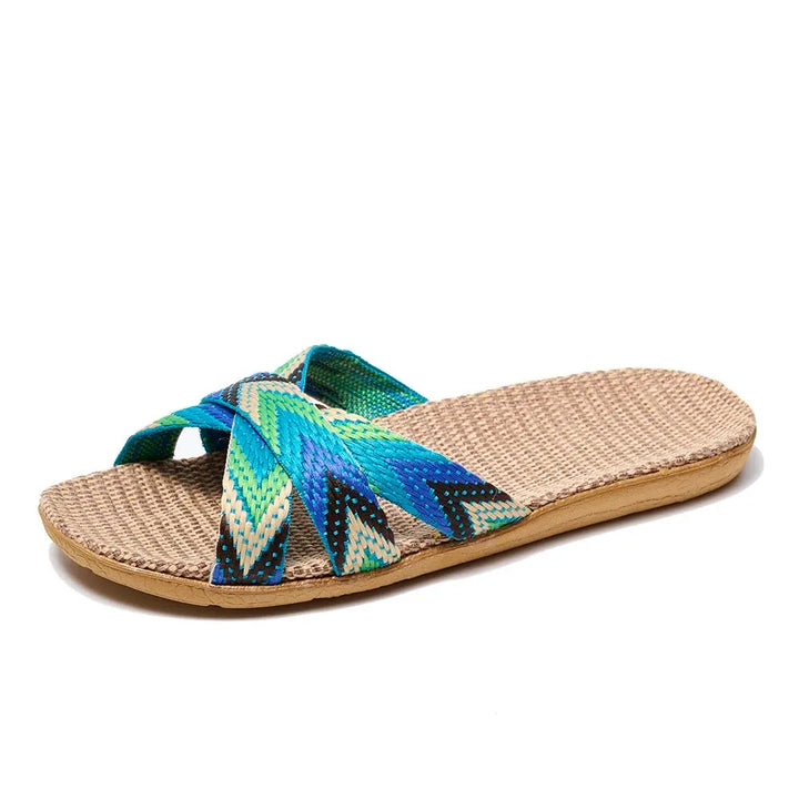 Woven sandal with colorful strap on a white background