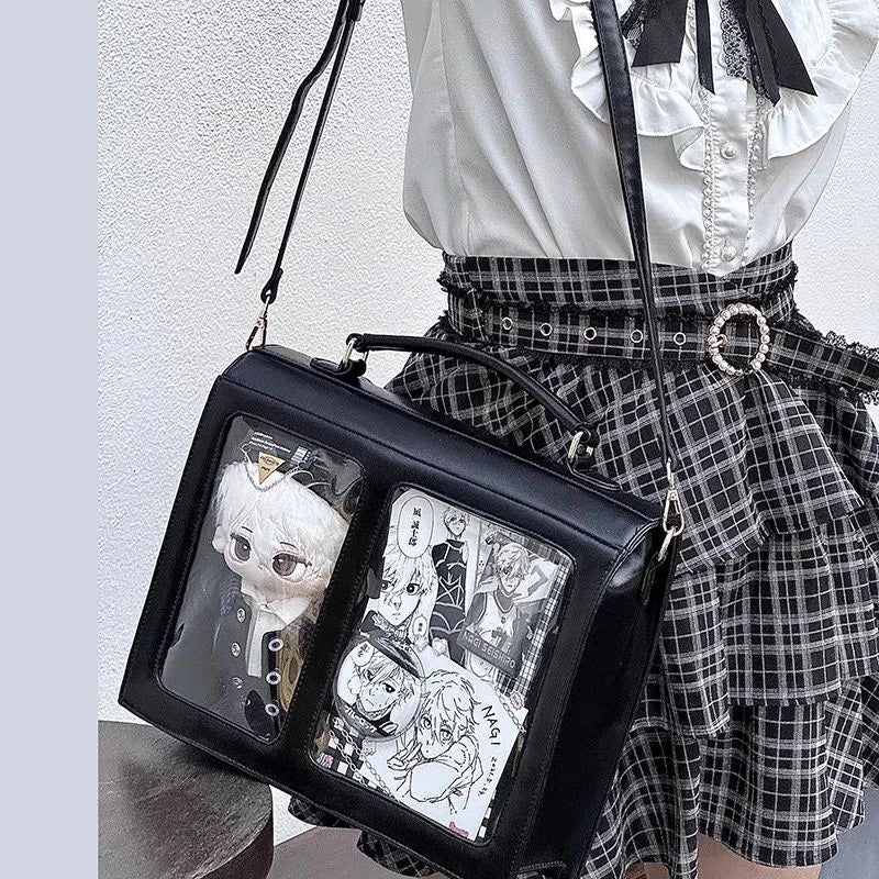 Black crossbody bag with transparent window front and adjustable shoulder strap