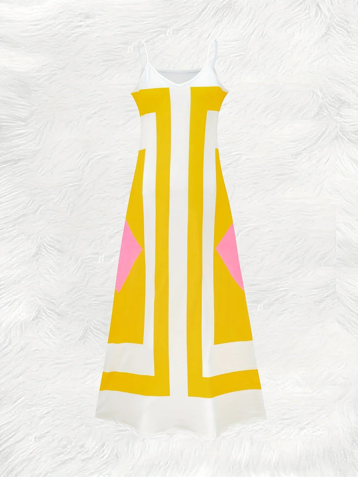 Yellow and white dress with pink accents on a textured white background