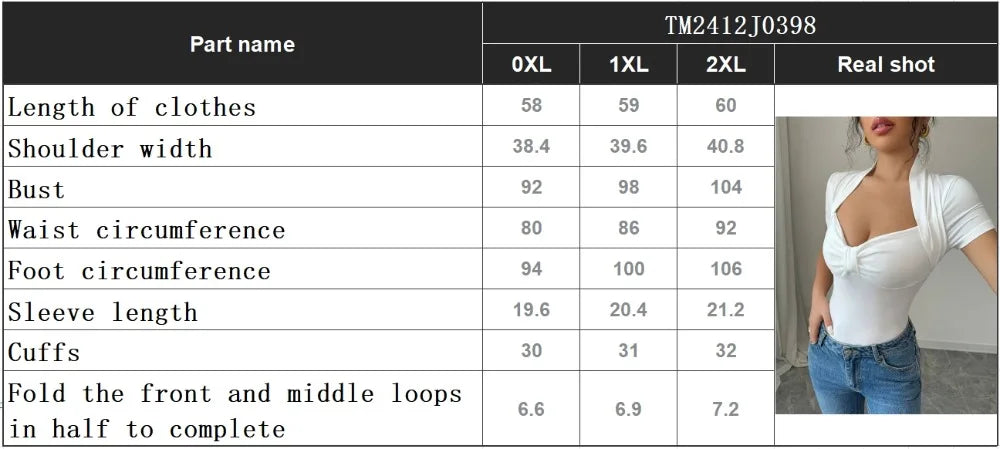 Measurement chart for clothing sizes with a real shot of a person wearing a white top and blue jeans.