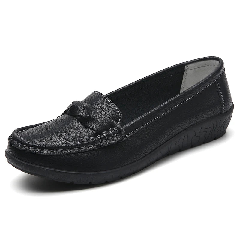 Black loafer shoe on a white background