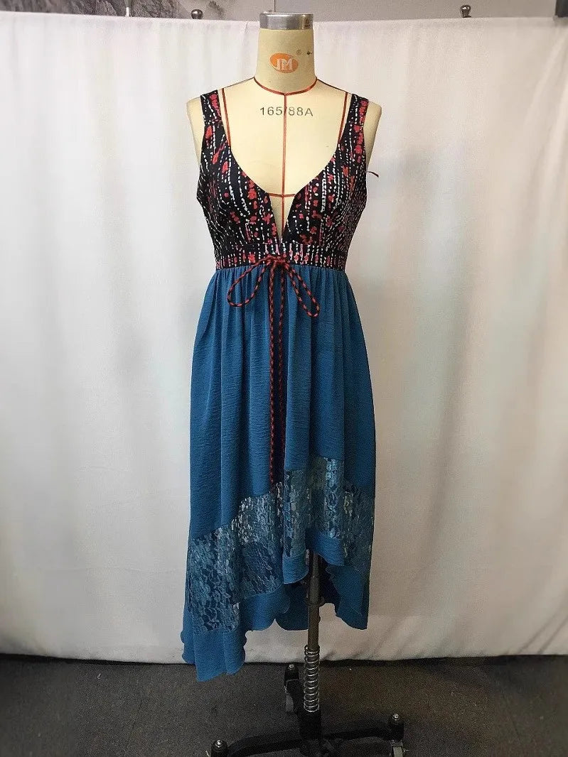 Peacock blue sleeveless V-neck dress with patterned black bodice and lace-trim hem