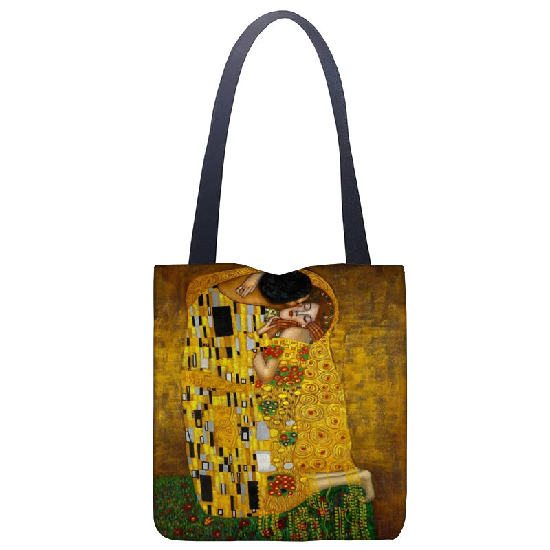Klimt Kiss linen shoulder tote bag with gold-toned artwork and navy handles