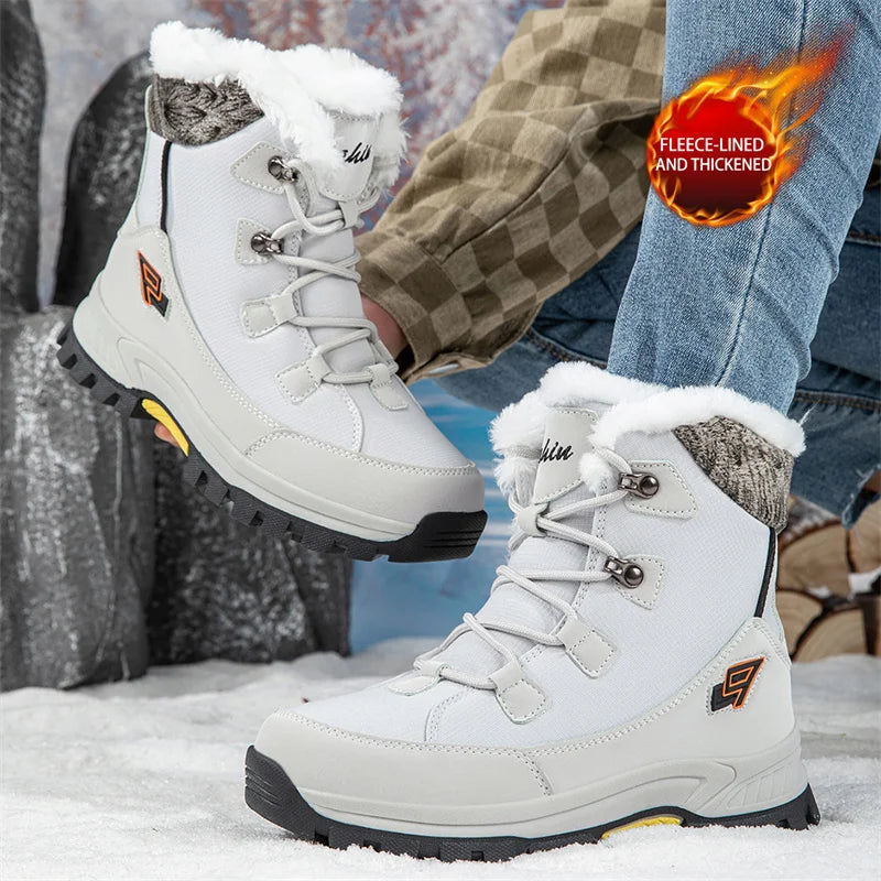 White lace-up platform ski boots with plush fur collar and grippy tread