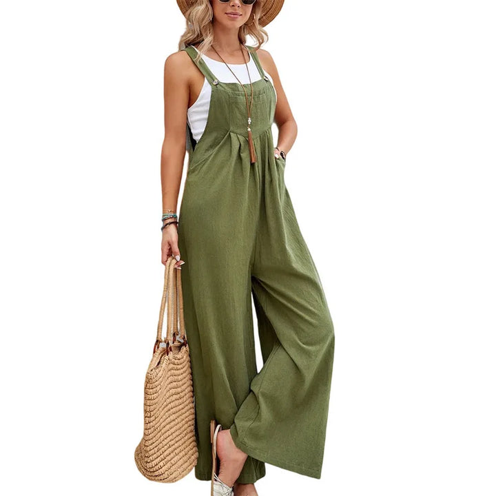 Olive green sleeveless jumpsuit with adjustable straps and relaxed wide-leg trousers