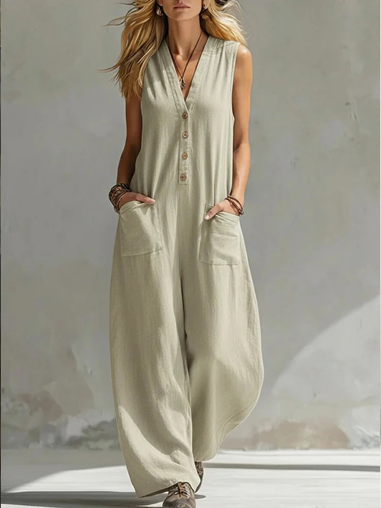 Women's light beige sleeveless V-neck button jumpsuit with patch pockets, wide-leg
