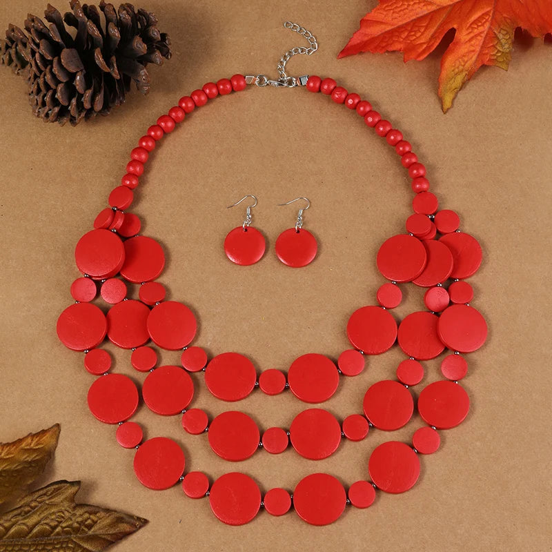 Red multilayer disc beaded necklace set with matching round dangle earrings